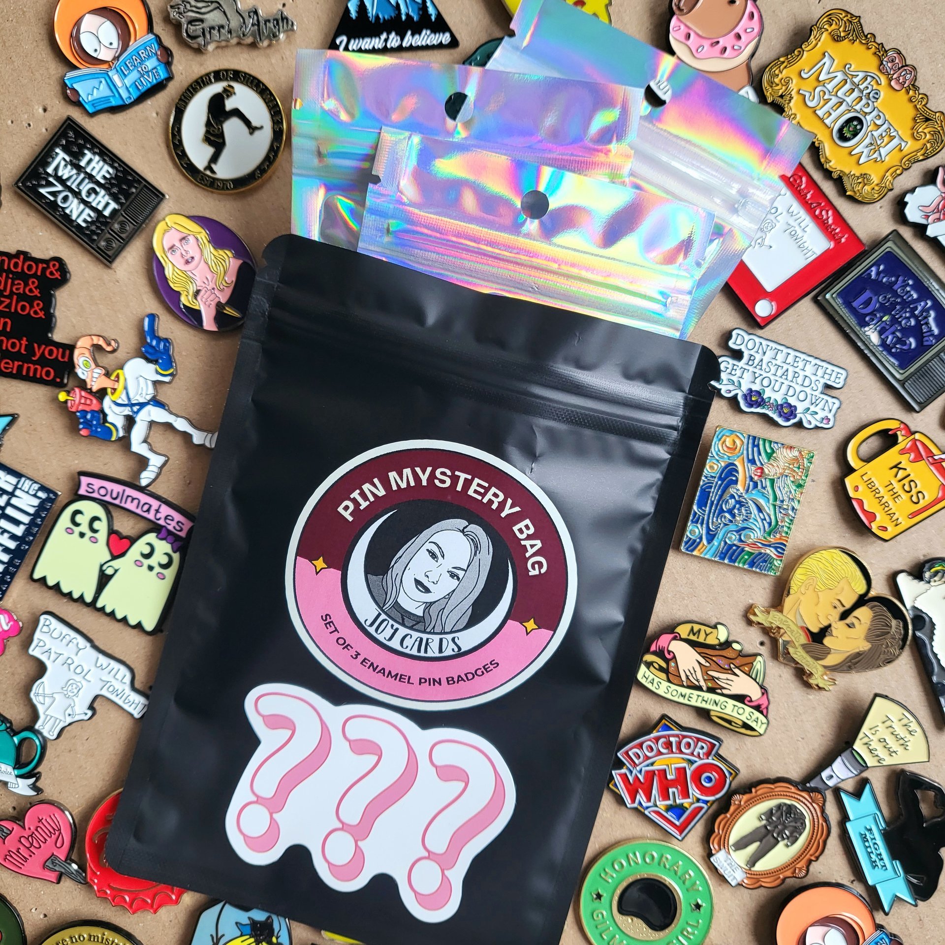 Enamel Pin badge mystery bag featuring 3 enamel pin badges. Enamel pin blind bag gift.
