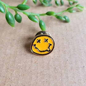 Nirvana enamel pin badge, yellow nirvana smiley face.