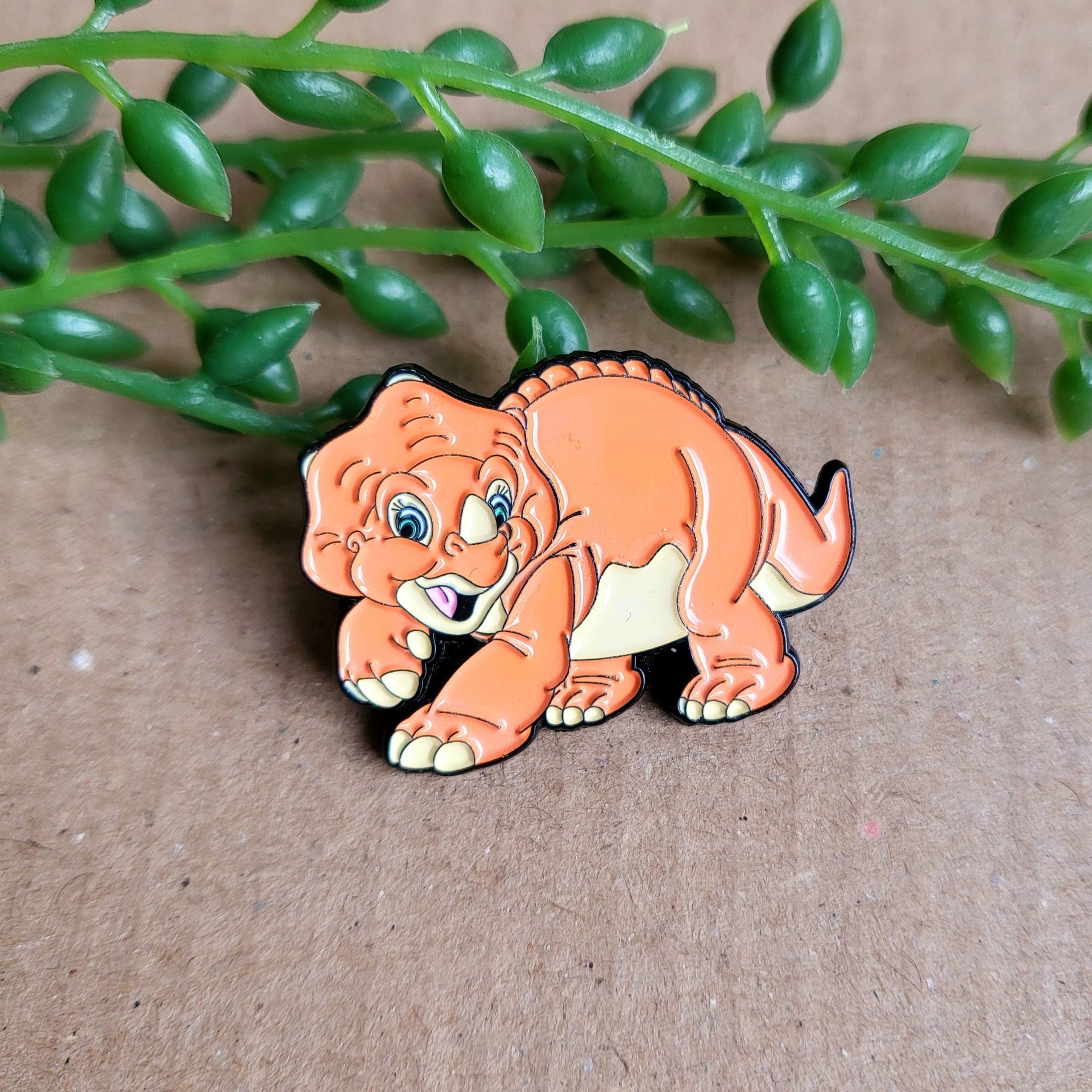 The land before time enamel pin, cera the dinosaur, 1990s animated film enamel pin badge