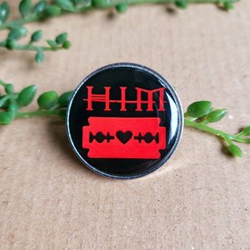 HIM pin badge