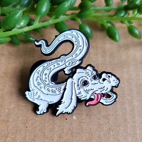 Falkor enamel pin badge featuring the luck dragon from The Neverending Story.